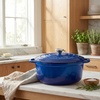 image:imageZulay Kitchen 64QT Enameled Cast Iron Dutch Oven Pot with Lid Heat Pad amp Trivet HeavyDuty Soup Pot for Stews Braising Roasting amp Sourdough Bread Baking Oven Safe up to 500F  Ablaze RedBlue