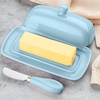 image:imageZulay Kitchen Ceramic Butter Dish with Lid For Countertop amp Stainless Steel Knife  Keeps Butter Soft amp Fresh  White Butter Dish with EasyGrip Knob Durable amp Everyday Butter Holder for Home  WhiteDish  Light Blue
