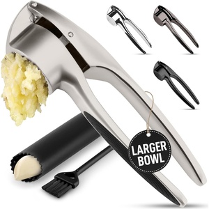 image:imageZulay Kitchen Premium Garlic Press Set  Rust Proof Professional Garlic Mincer Tool  EasySqueeze EasyClean with Soft Ergonomic Handle  Silicone Garlic Peeler amp Brush SilverPremium Imperial Silver